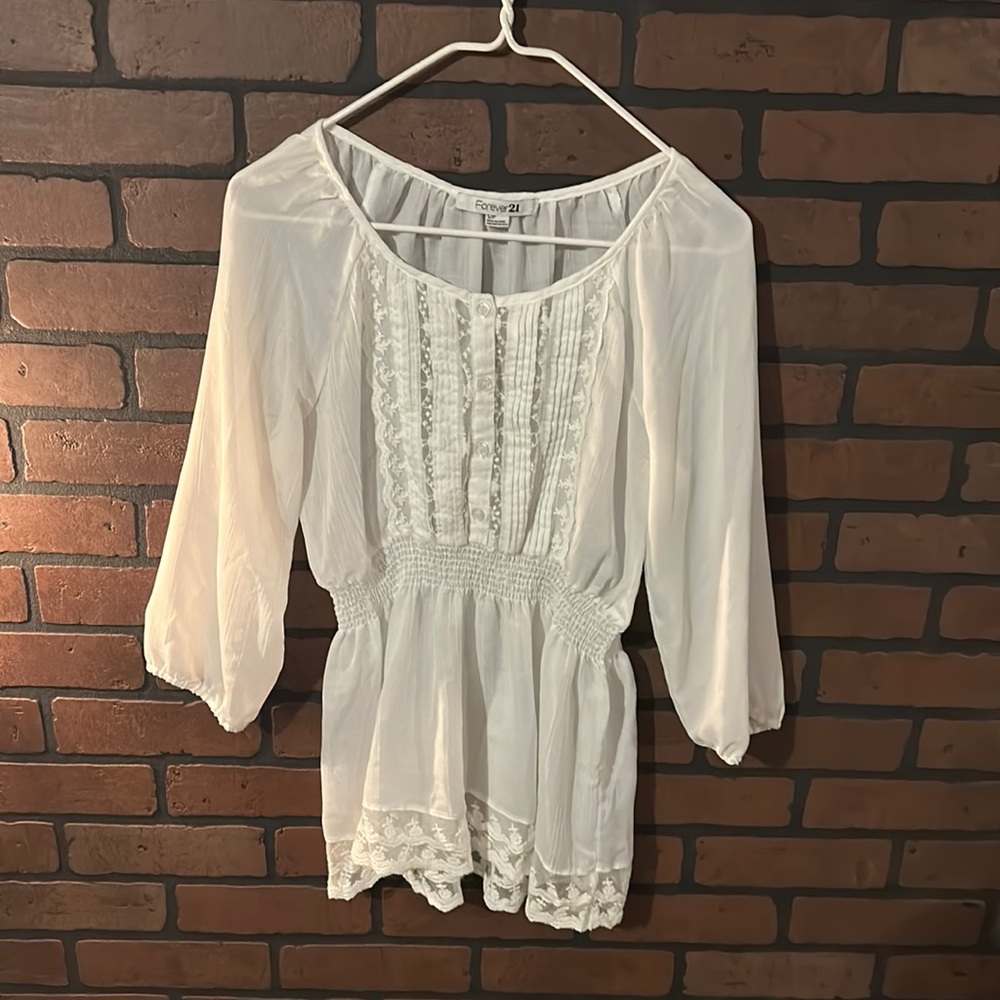 Sheer 3/4 sleeve peplum blouse